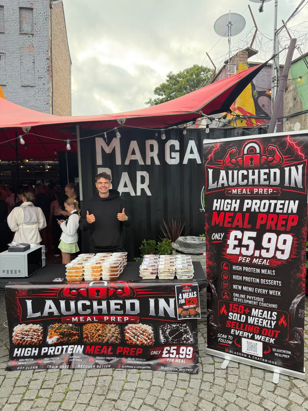 The Lauched In stall at an outdoor market